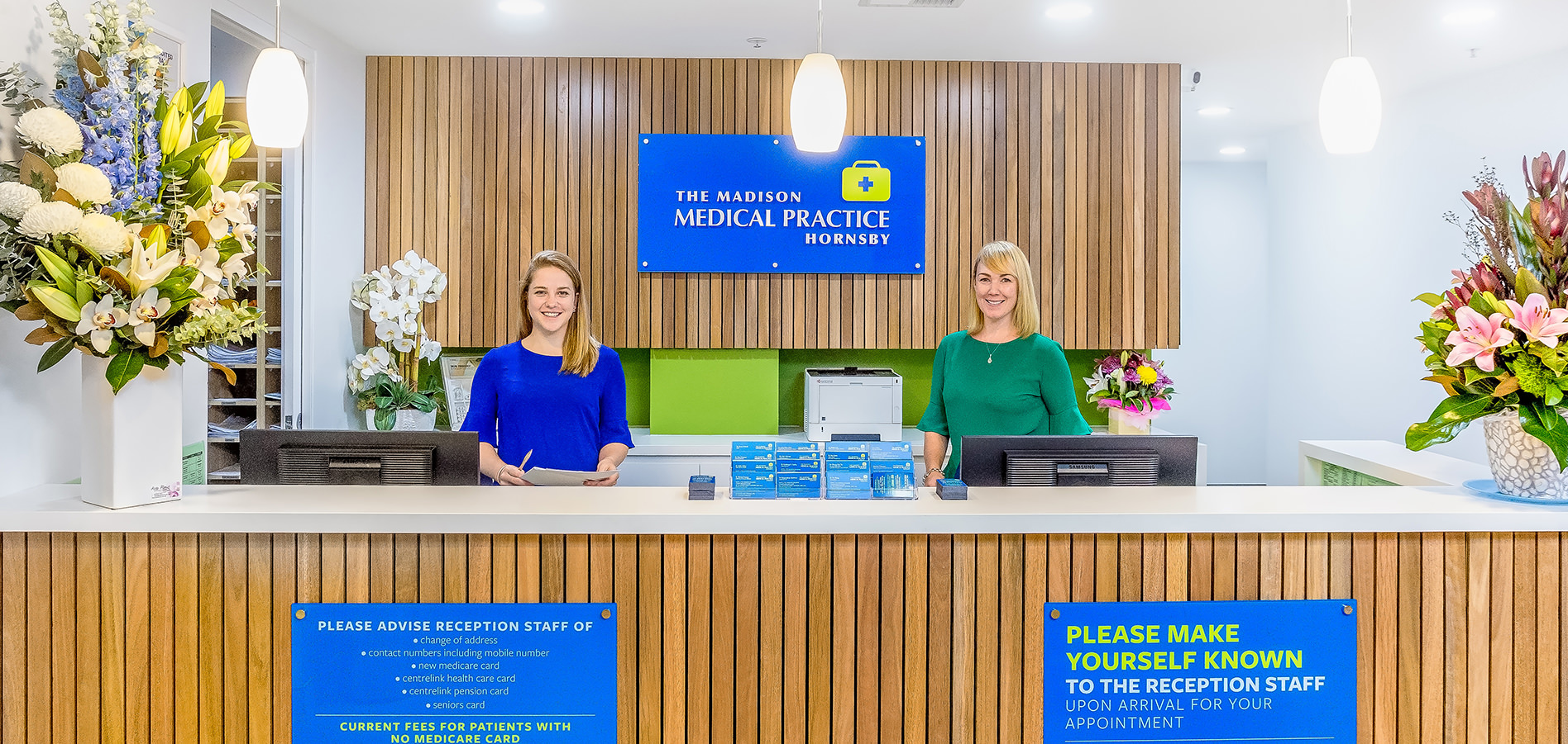 Medical reception desk at The Madison Medical Practice Hornsby with two welcoming staff members