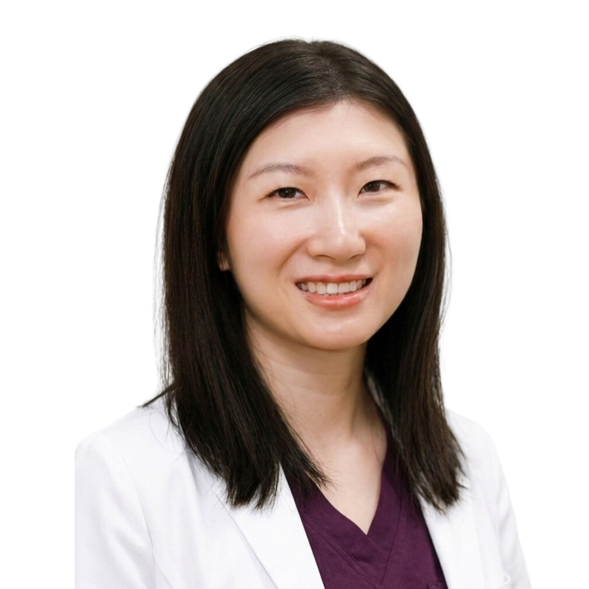 Professional headshot of female healthcare practitioner smiling at camera